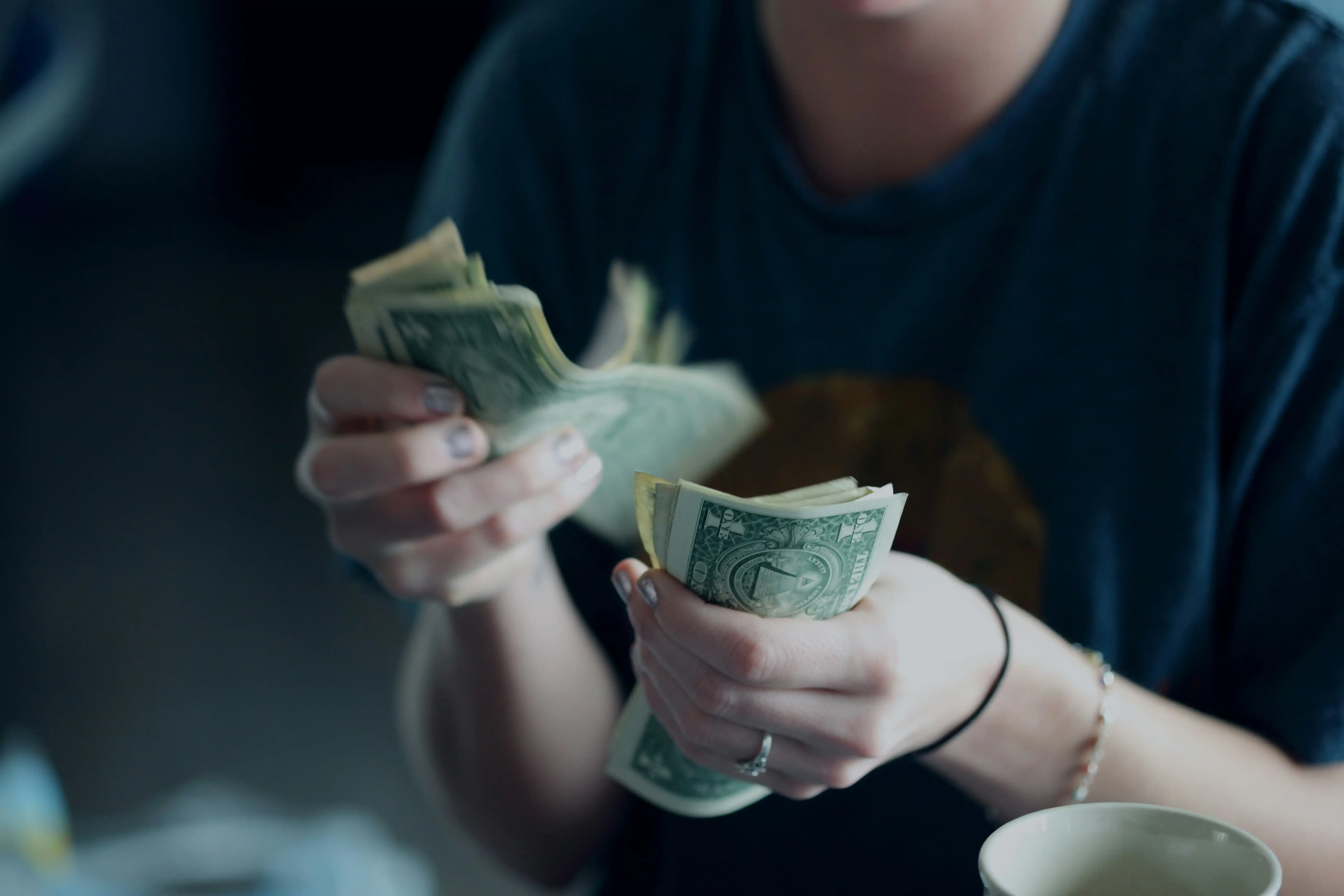 A man counting money.